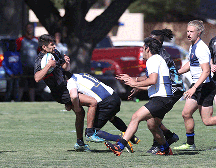 Sean Reed makes tackles an opponent